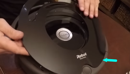 remove front cover of Roomba